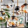 Gastor ceiling light, globe light gold, black, 5-light sources