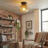 Ripoll ceiling light, globe light gold, clear, 1-light source