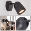 LED Wall Spotlight Lemak with a modern cylindrical black metal shade, swivelling light head