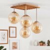 Globe light Gastor with four amber Boho-style glass shades in a cluster arrangement