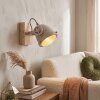 Sand-coloured wall spotlight Herford, adjustable dome head, as a bedside reading light