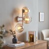 Modern Wall Light Koyoto with a vertical cluster of three amber and clear glass shades