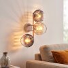 Modern Globe wall light Koyoto with three smoke and amber glass shades for the couch