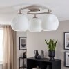 Modern Globe Ceiling Light Ripoll with three clustered white glass shades