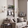 Globe wall light Koyoto, 2-piece set with three clear glass shades on a vertical bar