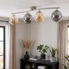 Modern Globe ceiling light Gastor with four smoke and amber glass shades on a curved bar