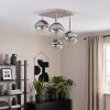 Modern Cluster Ceiling Light Koyoto with four glass shades, over the dining table