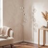 Modern Globe floor lamp Ripoll with six clustered clear glass shades, sand-coloured stand