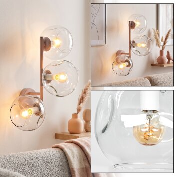 Modern globe wall light Ripoll with three clear glass shades in vertical arrangement