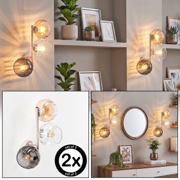 Modern globe wall light Koyoto, 2-piece set, three stacked glass shades, beside a mirror