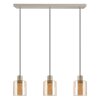 Brilliant Linear Pendant Light Lyska for kitchen islands, with 3 amber glass shades