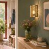 Brilliant Oriental semi-circular wall light Molly with intricate leaf cutouts
